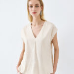 Metallic top with belt