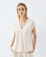 Metallic top with belt