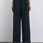 Pants with drawstring and pleats