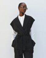 Sleeveless blazer with belt