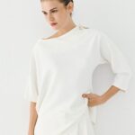 Blouse with asymmetric sleeves